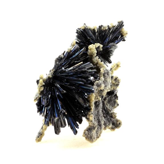 Calcite + Stibnite.