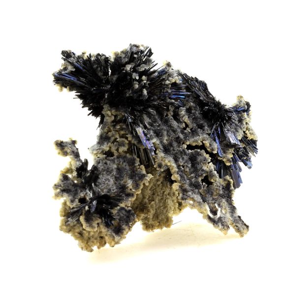 Calcite + Stibnite.