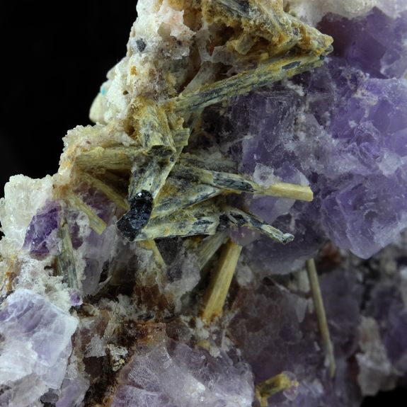 Fluorite + Stibiconite.