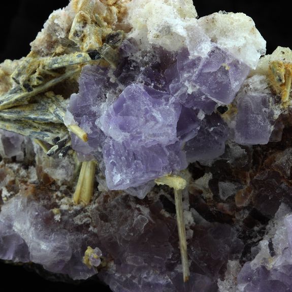 Fluorite + Stibiconite.