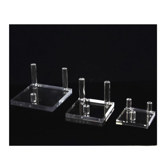 Square display stand for minerals.