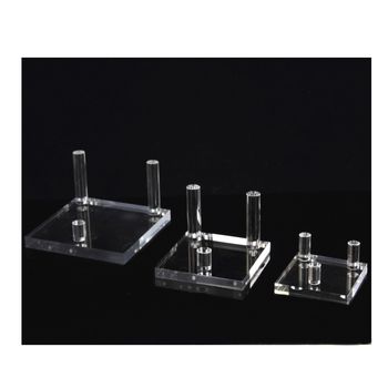 Square display stand for minerals.