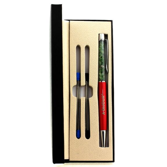 Raw Tsavorite Garnet mineral pen Tanzania.