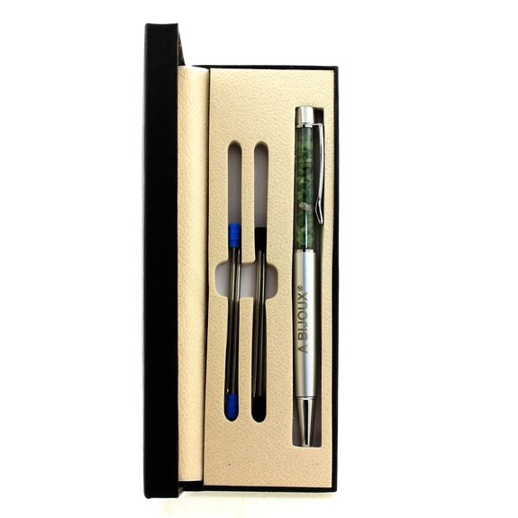 Raw Tsavorite Garnet mineral pen Tanzania.