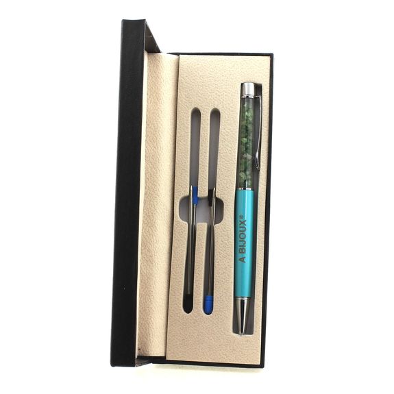 Raw Tsavorite Garnet  mineral pen Tanzania.