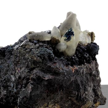 Calcite + Chalcopyrite + Marcasite + Pyrite. 6240.0 ct.