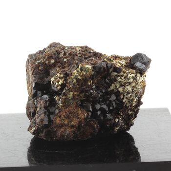 Andradite Garnet (Var: Melanite) + Magnetite + Quartz + Scapolite. 1171.50 ct.