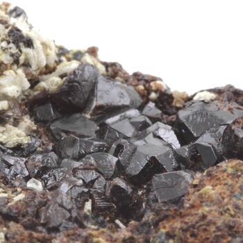 Andradite Garnet (Var: Melanite) + Magnetite + Quartz + Scapolite. 1171.50 ct.