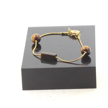 Bracelet en acier doré inoxydable 1 Perle Oeil de Tigre rectangle 13 mm + 2 perles ronde 8 mm.