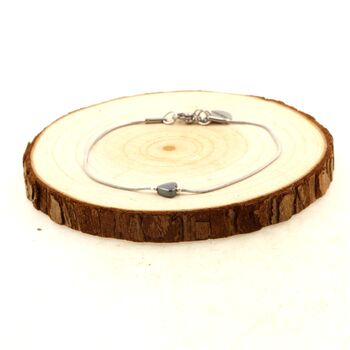 Bracelet en acier inoxydable 1 Perle Hématite forme coeur 5 mm.