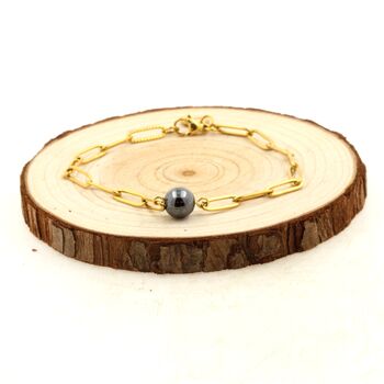 Bracelet en acier doré inoxydable double chaine (3x11mm) 1 Perle Hématite 8 mm.