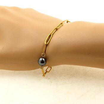 Bracelet en acier doré inoxydable double chaine (3x11mm) 1 Perle Hématite 8 mm.