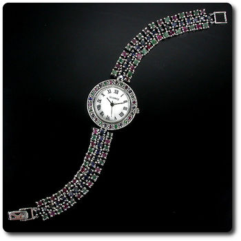 MONTRE RUBIS SAPHIR EMERAUDE