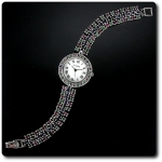 MONTRE RUBIS SAPHIR EMERAUDE