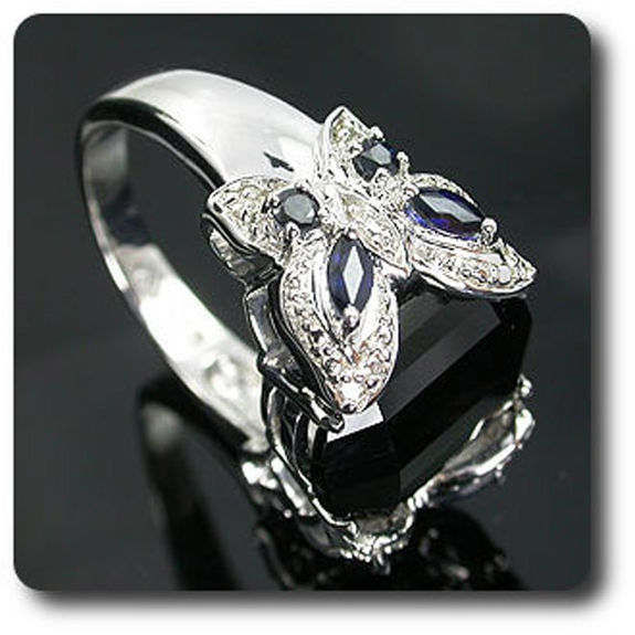 BLACK ONYX , BLUE SAPPHIRE & DIAMOND RING