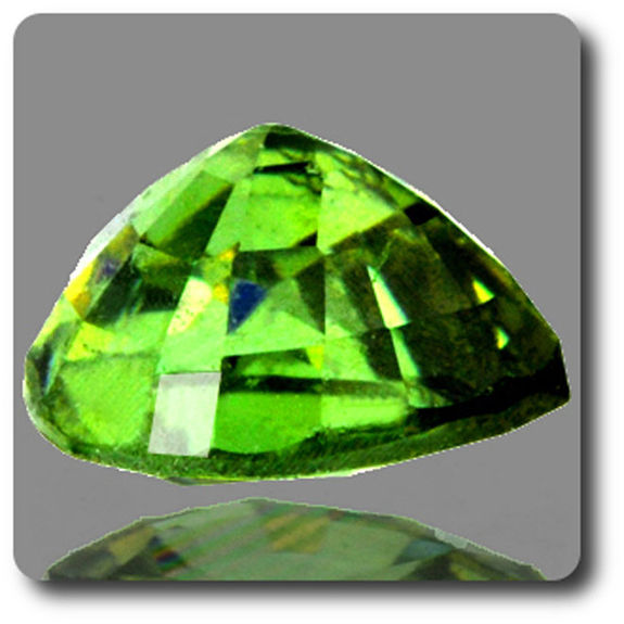 0.61CT. DEMANTOID GARNET. IF