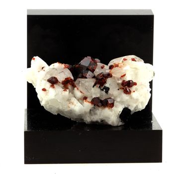 Spessartine Garnet, Orthoclase, Quartz, Tourmaline.