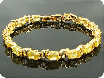 12 x 7mm Yellow Topazes Oval Cut Gold Bracelet