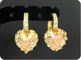 2x9mm Orange Sapphires Earrings