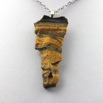 Collier Oeil de Tigre brut. 27.67 ct.
