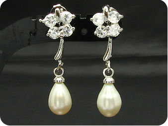 Voguish 2x7mm White Fresh Water Pearl Oval Cut Earrings
