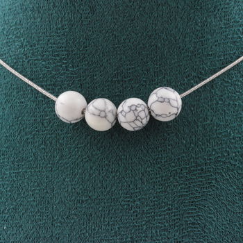 Howlite 8 mm 4 beads necklace. Stainless steel chain