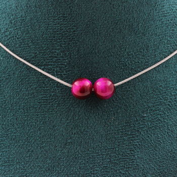 Collier 2 perles Oeil de Tigre fuschia 8 mm. Chaine en acier inoxydable