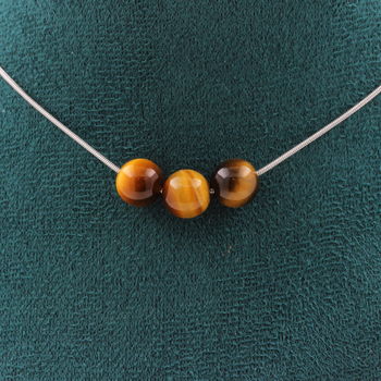 Collier 3 perles Oeil de Tigre 8 mm. Chaine en acier inoxydable