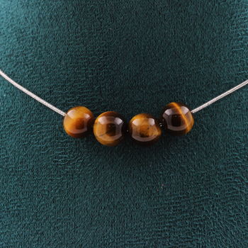 Collier 4 perles Oeil de Tigre 8 mm. Chaine en acier inoxydable
