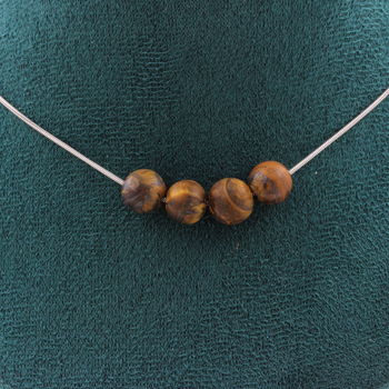 Collier 4 perles Oeil de Tigre mat 8 mm. Chaine en acier inoxydable