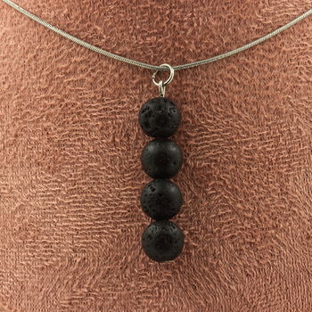 Necklace with 4 Lava beads 8 mm. Stainless steel chain
