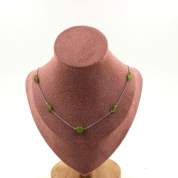 Peridot from Myanmar (Burma) + Peridot 8 mm beads necklace. Stainless steel chain