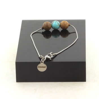 Bracelet en acier inoxydable 1 Perle Howlite Turquoise + bois 8 mm.