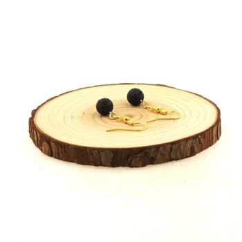 Golden stainless steel Earrings Black Lava 8 mm 1 Bead.