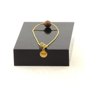 Bracelet en acier inoxydable doré 1 Perle bois 8 mm.