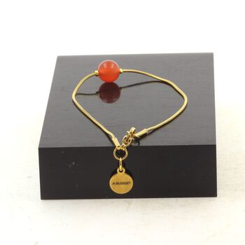 Golden stainless steel bracelet 1 Carnelian from Uruguay quality 5A 8 mm Bead.