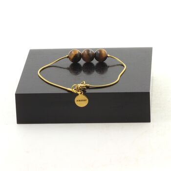 Golden stainless steel bracelet 3 Tiger Eye Beads 8mm.