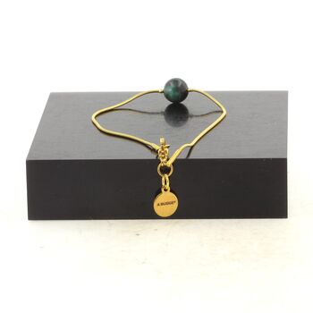 Golden stainless steel bracelet 1 Emerald from Zambia Quality 3A Bead 8 mm.