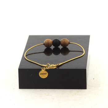 Bracelet en acier doré inoxydable 1 Perle Onyx noir mat + bois 8 mm.