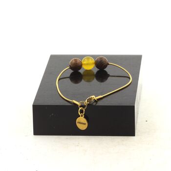 Bracelet en acier doré inoxydable 1 Perle Agate jaune + bois 8 mm.