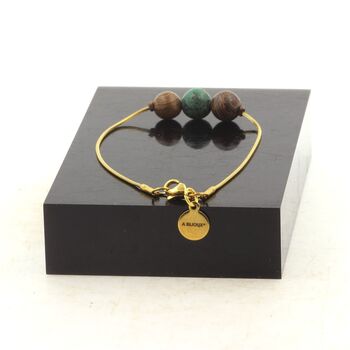 Golden stainless steel bracelet 1 African Turquoise + wood 8 mm Bead.