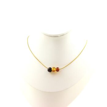 Collier 3 perles Ambre véritable de la mer Baltique. Chaine en acier doré inoxydable