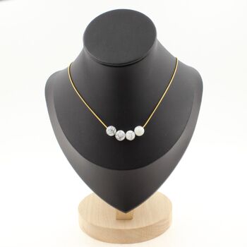 Howlite 8 mm 4 beads necklace. Golden Stainless steel chain