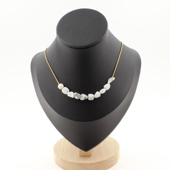 Howlite from the USA 10 beads necklace. Golden stainless steel chain