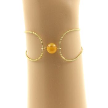Golden Stainless steel bracelet 1 yellow Sardonyx bead 8mm.