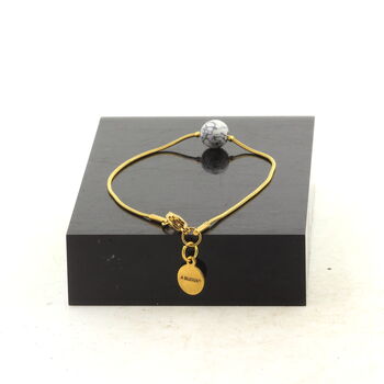 Golden Stainless steel bracelet 1 Howlite 8 mm Bead.