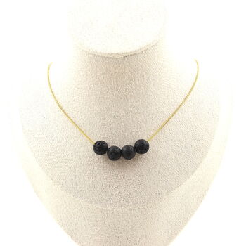 Collier 4 perles Lave 8 mm. Chaine en acier doré inoxydable