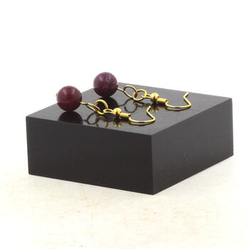 Golden Stainless steel Earrings Garnet 8 mm 1 Bead.