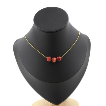 Two-tone peach Tiger's Eye 8 mm 3 beads necklace. Golden stainless steel chain