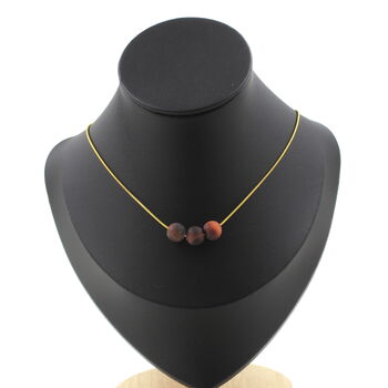 Matte red Tiger's Eye 8 mm 3 beads necklace. Golden stainless steel chain